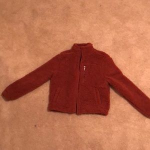 Super soft coat colored brown size adult medium